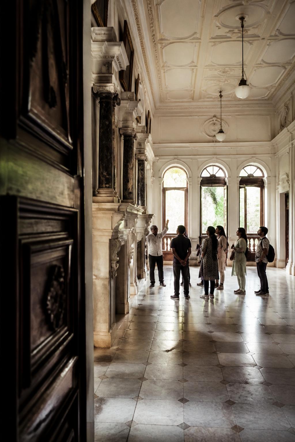 Visitors exploring SPPU’s historic interiors during a heritage walk.