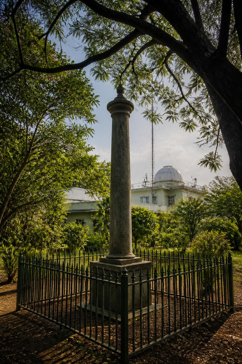 The observatory pillar remains quietly embedded in modern Nungambakkam.