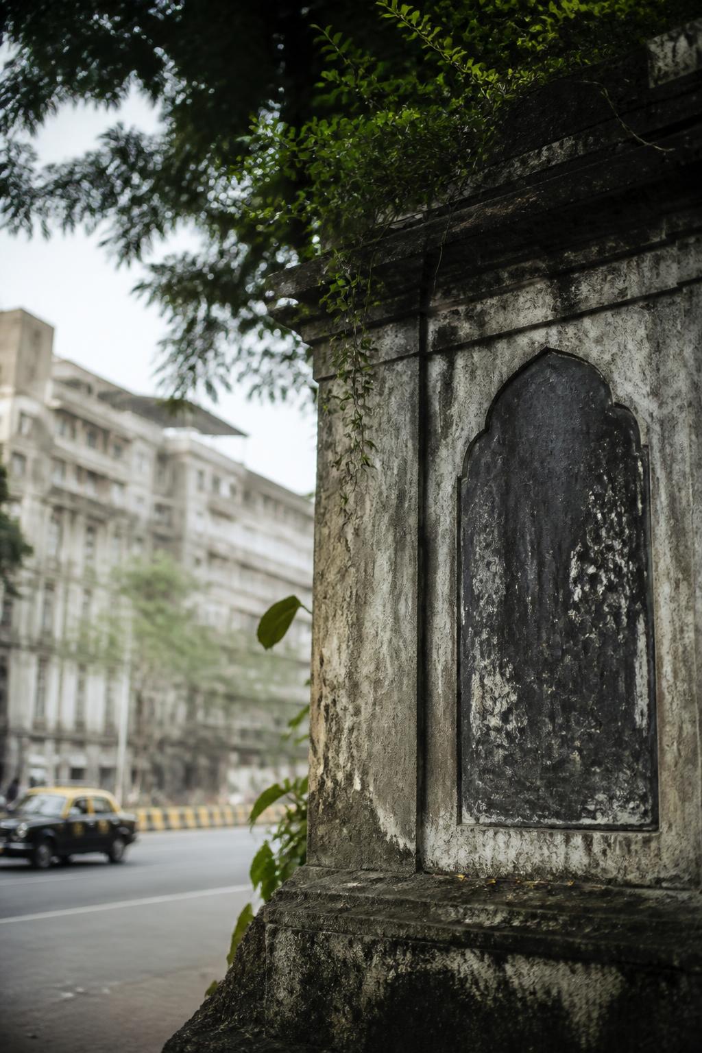 A weathered plaque site is the remaining visible reminder of Framjee Cowasji Tank.