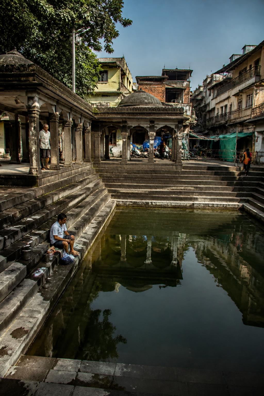 A surviving historic water cistern embedded in Pune’s old city.
