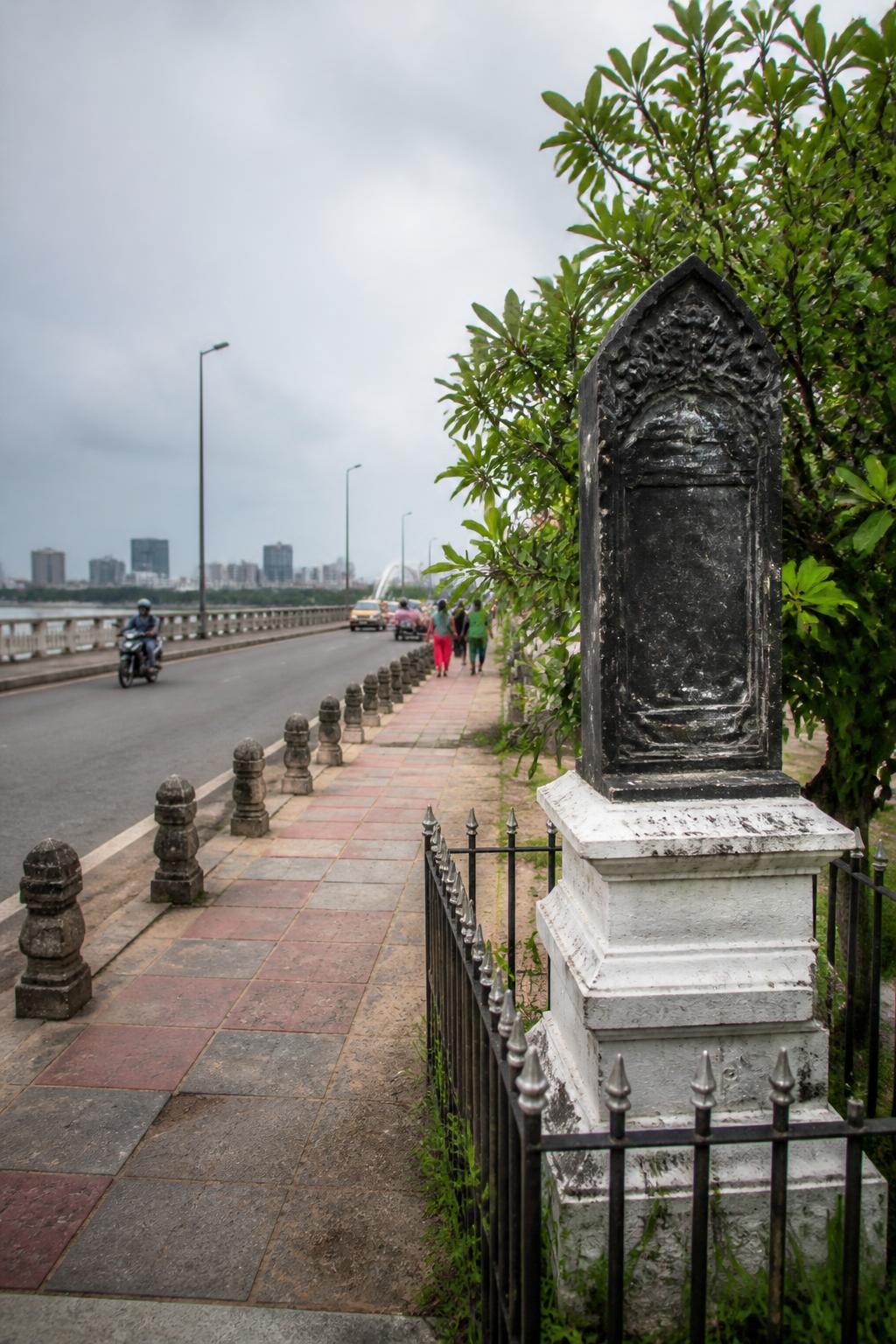 The restored Marmalong Bridge stele surviving beside the modern Adyar crossing in Saidapet.