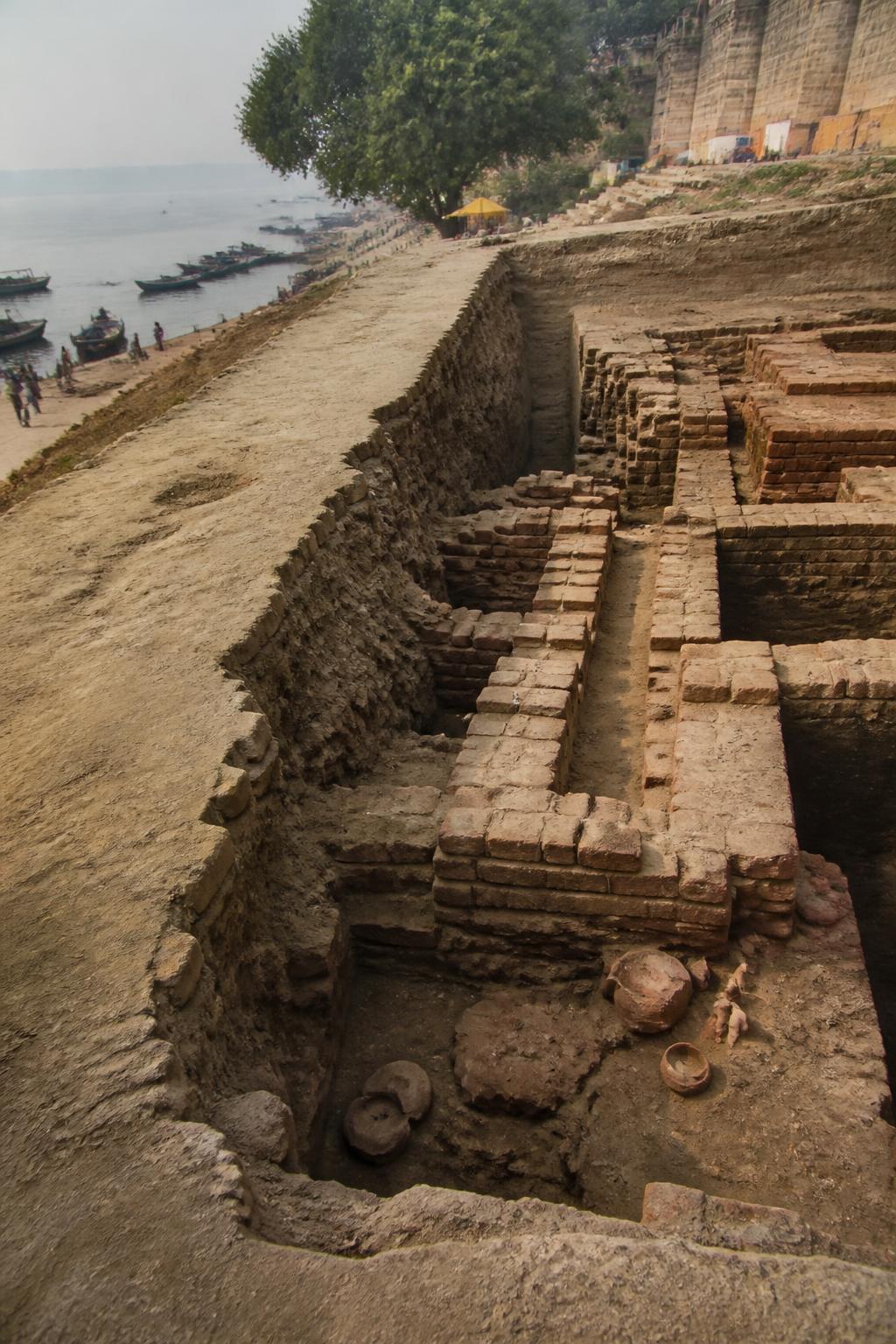 Excavated brick structures and lanes reveal an organised ancient settlement at Rajghat.