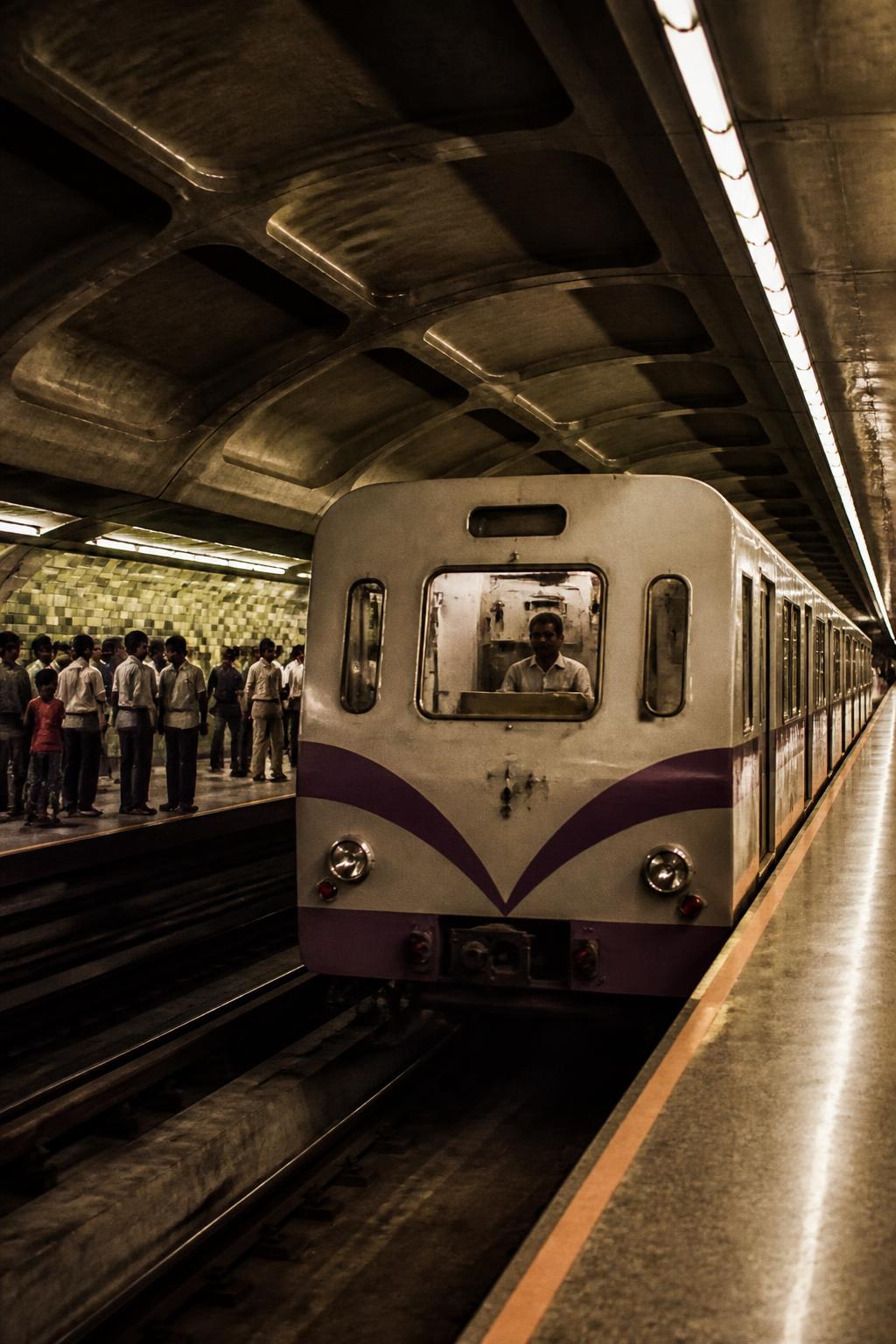 A period Kolkata Metro train and commuters representing the opening of India’s first Metro service in 1984.