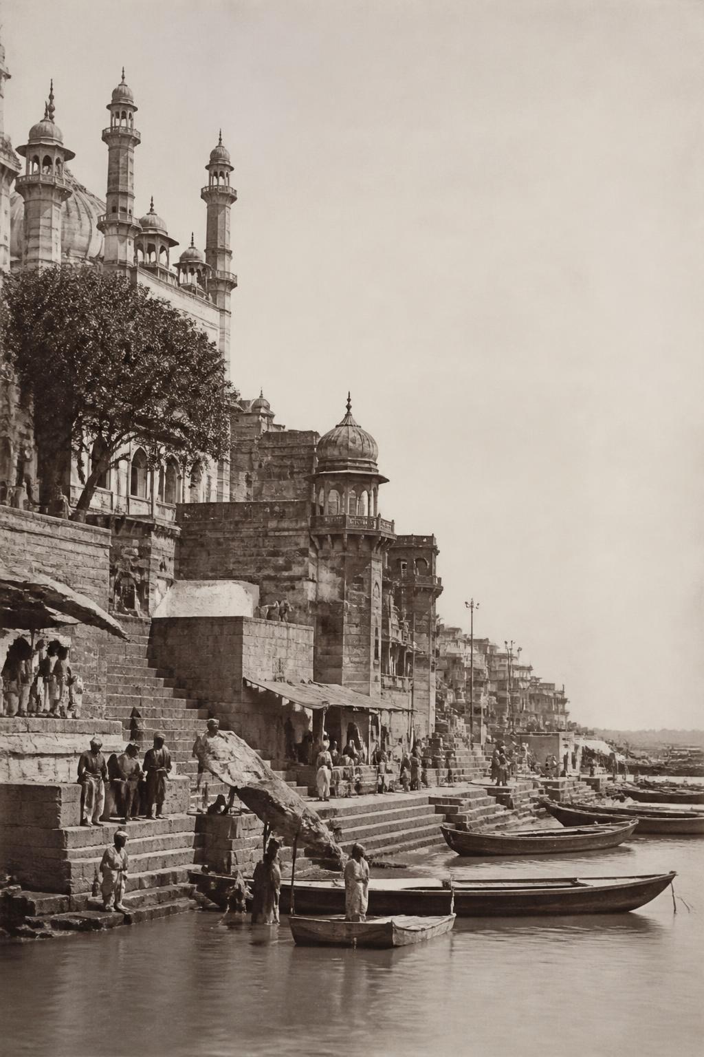 A late-19th-century archival-style view of Varanasi’s ghats and river life.